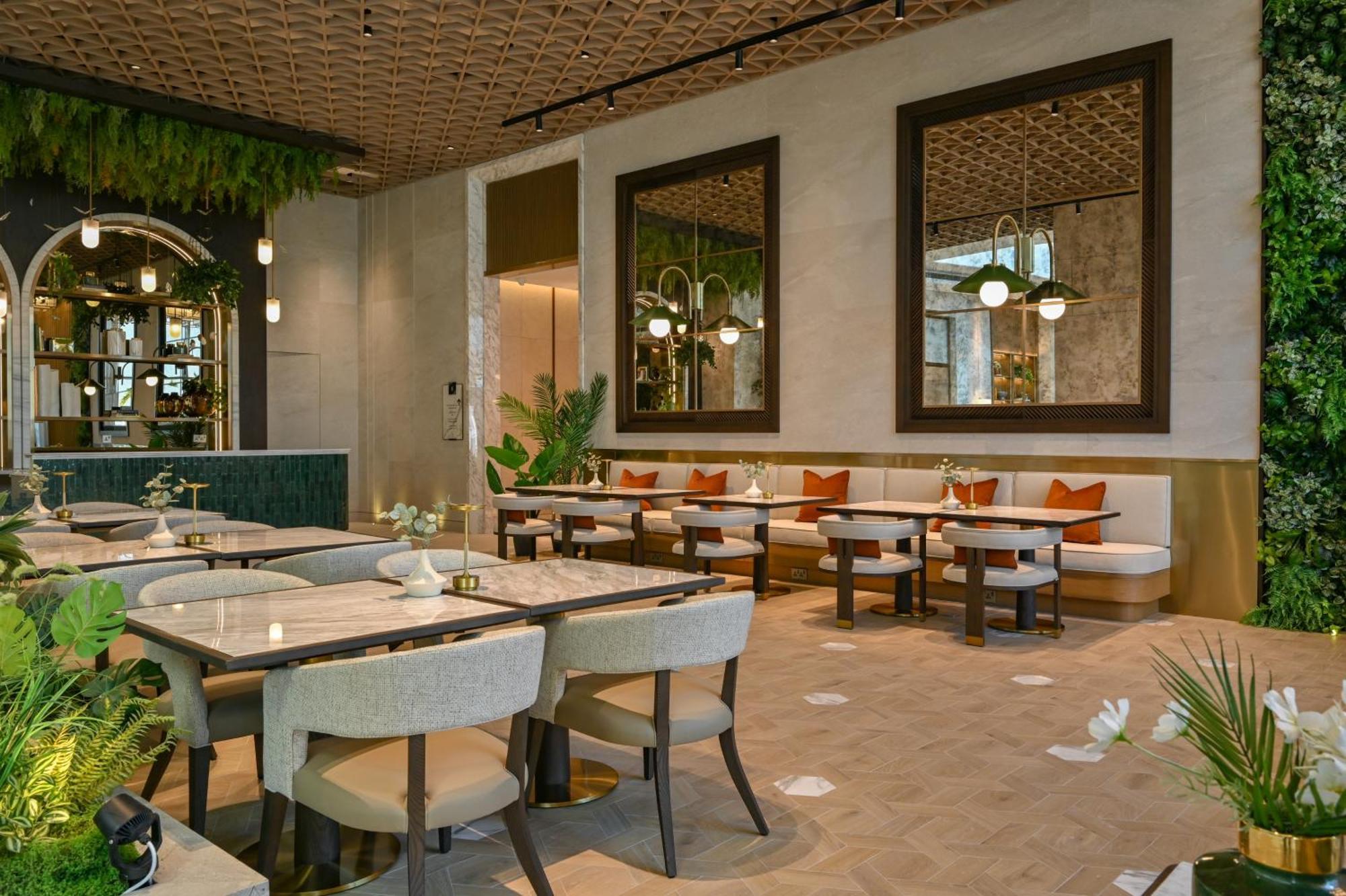 Onyx Rotana Hotel Manáma Kültér fotó The interior of the restaurant