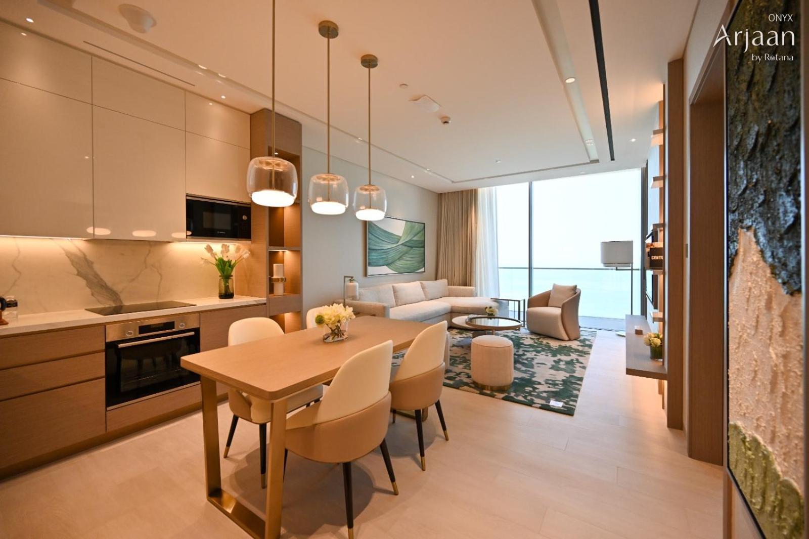 Onyx Rotana Hotel Manáma Kültér fotó A living room at the Ritz-Carlton, DIFC